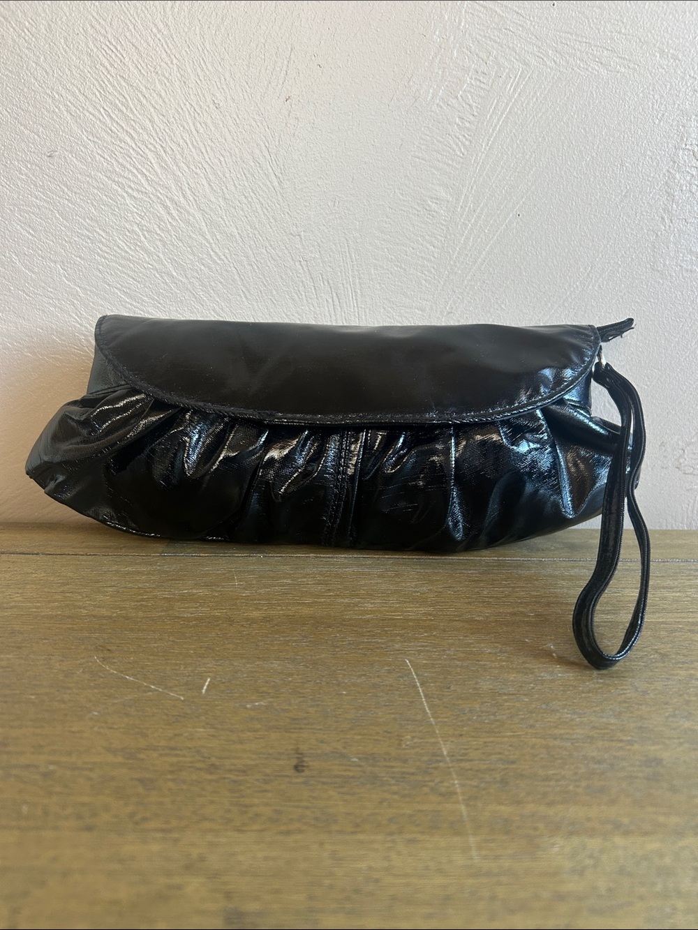 Unbranded Glossy Black Faux Leather Wristlet Clutch. Flap Closure-Pleated Body.